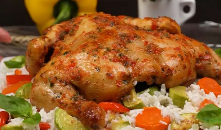 Pollo intero con riso